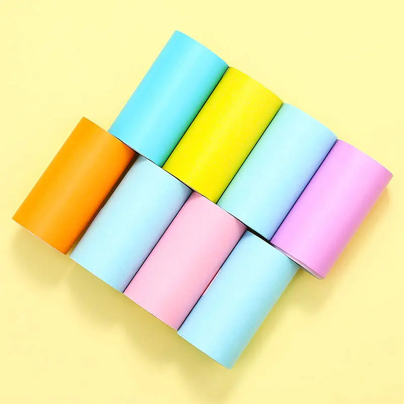 Colorful Paper Rolls On Yellow Background